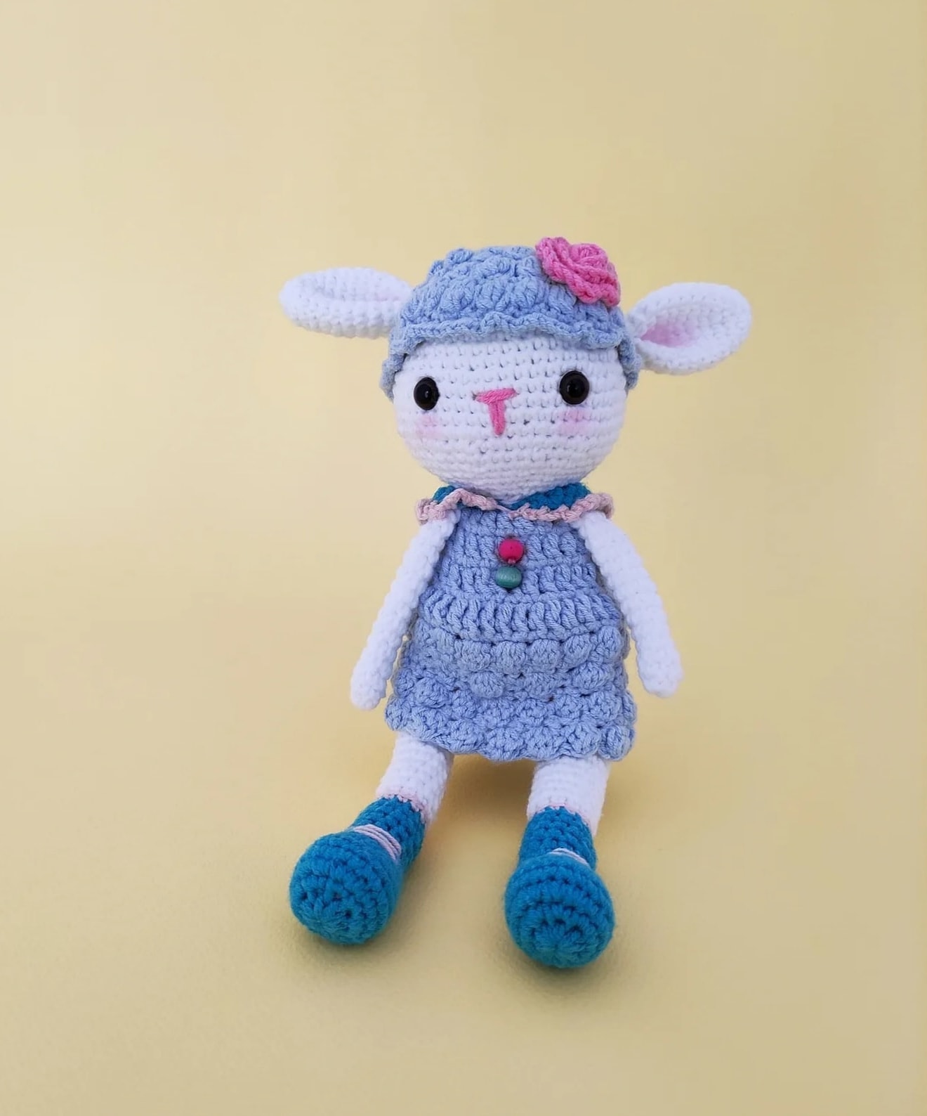 Handmade crocheted amigurumi lamb